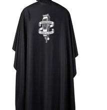 Professional barber jacket providing comfort, durability, and a sharp look while protecting clothing during hair cutting and grooming services.