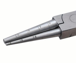 Close-up of a gun with numbered barrels on a white background