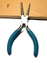 Pair of pliers with blue handles on a white background